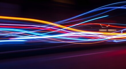 Abstract light trails of colorful streaks in motion, ideal for technology, digital, and futuristic design. Evokes speed, energy, and digital data flow.