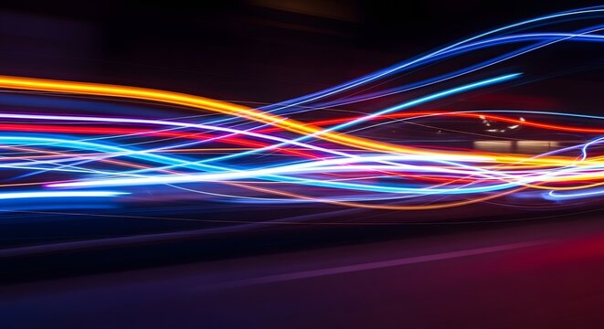 Abstract light trails of colorful streaks in motion, ideal for technology, digital, and futuristic design. Evokes speed, energy, and digital data flow.