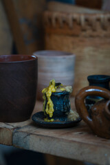 a candle that burned out and went out in a candlestick on the table
