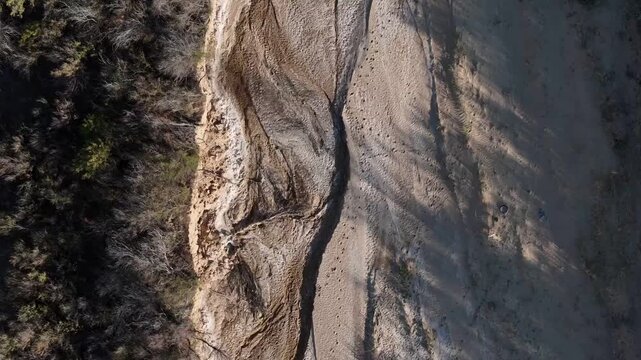Aerial top down of empty dried up river bed on historic route 66 in Lupton Arizona AZ