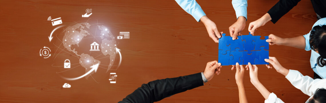 A team collaborates around a table, holding a puzzle piece, symbolizing partnership and strategy in business and finance. The global network visualization enhances the message. Trope - Powered by Adobe