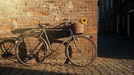 Vintage Bicycle with Sunflower Leaning Against Brick Wall in Sunlight. - Powered by Adobe