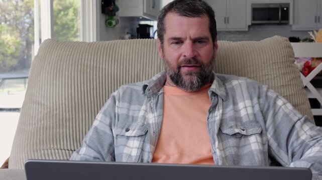 Man in White and Gray Flannel Shirt Online Shopping - E-Commerce Technology at Home Concept