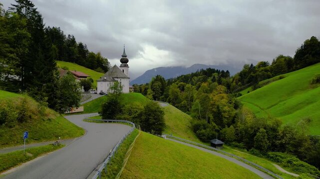 Aerial view of historic Wallfahrtskirche Maria Gern church under rain near Berchtesgaden city in Germany