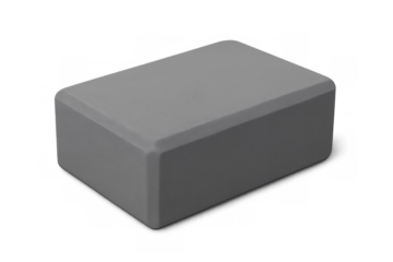 Gray yoga block supporting fitness and exercise practice