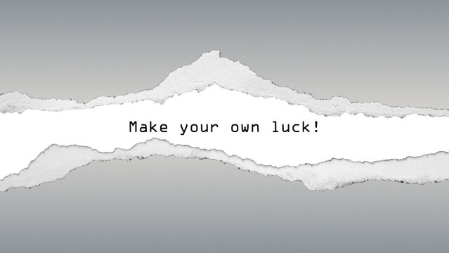 Motivational quote “Make your own luck!” on torn paper background. Encouraging minimalist design for self-confidence, drive, and success attitude.