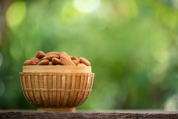 Almond seeds on natural background.