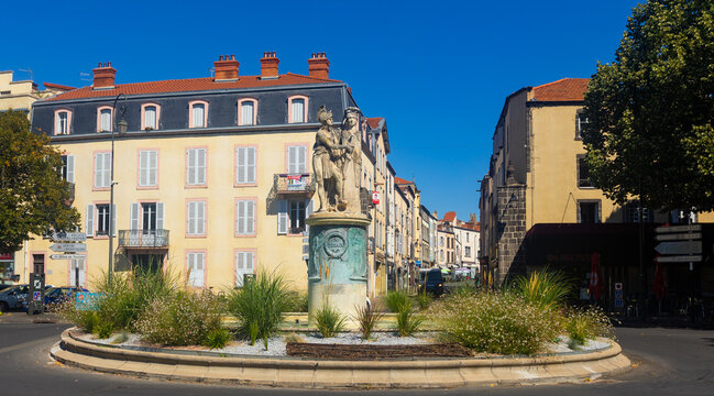 RIOM, FRANCE - August 12, 2022: Fountain honoring memory of General Louis Charles Antoine Desaix, installed in center of Place J.B. Laurent in Riom, France