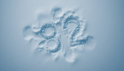 Frozen bubbles create polka dot pattern resembling number 82 in unique design