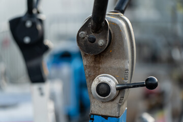 Close-up view of industrial control lever mechanism made of metal, representing mechanical equipment control system, engineering precision, industrial machinery design and construction tool operation