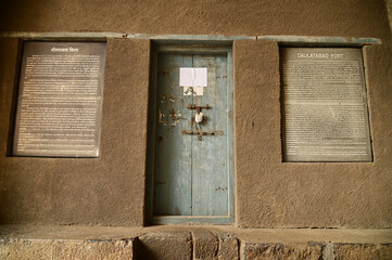Wooden classic door at Daulatabad Fort is an ancient fort located in Maharashtra, India. Originally named Deogiri, it is a fort built from natural rocks and is very strong.