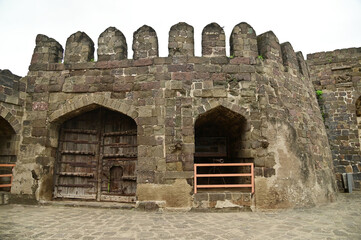 Daulatabad fort entrance in maharashtra india. Built with massive stone walls showcasing medieval military architecture and cultural heritage.It is now an  tourist attraction with historical building.