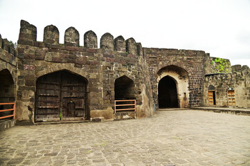 Daulatabad fort entrance in maharashtra india. Built with massive stone walls showcasing medieval military architecture and cultural heritage.It is now an  tourist attraction with historical building.