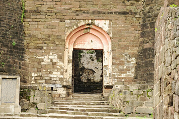 Daulatabad fort entrance in maharashtra india. Built with massive stone walls showcasing medieval military architecture and cultural heritage.It is now an  tourist attraction with historical building.