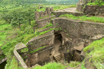 Daulatabad fort entrance in maharashtra india. Built with massive stone walls showcasing medieval military architecture and cultural heritage.It is now an  tourist attraction with historical building.
