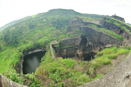 Walls and moats at Daulatabad Fort is an ancient fort located in Maharashtra, India. Originally named Deogiri,fort built from natural rocks and is very strong. it is a fort built from natural rocks.