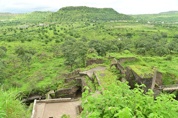 A top view of the walls of Daulatabad fort , Built with massive stone walls showcasing medieval military architecture and cultural heritageIt.