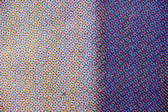 Close-Up of CMYK Halftone Dot Gradient from Light to Dark