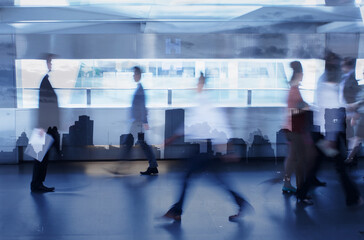 Busy Office Setting With Blurred Business People Figures Walking  Modern Architecture city, double exposure 