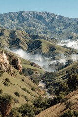 Rolling hills valley with fog, river