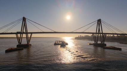 Obraz premium General Belgrano Bridge over Parana River at sunset, Corrientes, Argentina.