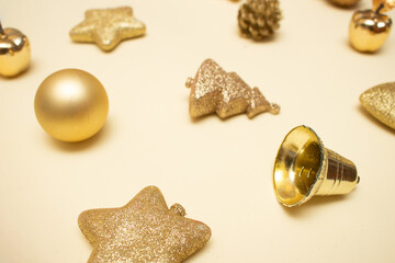 Golden Christmas ornaments on a colorful background
