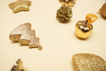Golden Christmas ornaments on a colorful background