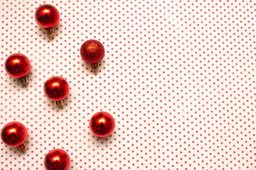 Golden Christmas ornaments on a colorful background