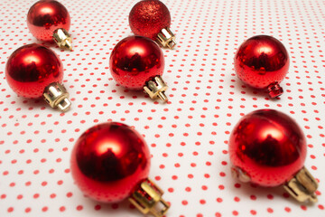 Golden Christmas ornaments on a colorful background
