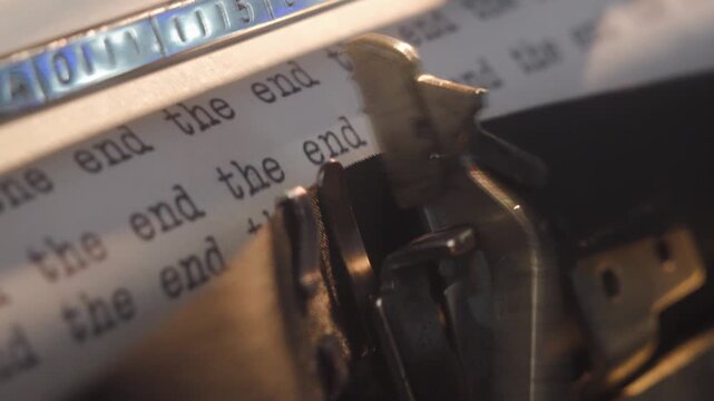 A lot of sign - The End - Typewriter Inscription. Many identical inscriptions on paper using a retro machine.