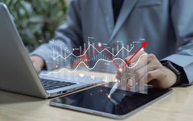 Businessman analyzing financial data using business intelligence tools, working with digital charts and analytics dashboard for strategic decision making and performance evaluation.