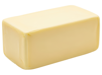 Unwrapped stick of golden yellow butter, essential ingredient for cooking and baking