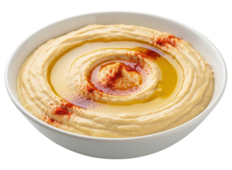 Creamy hummus dip with olive oil and paprika in a white bowl