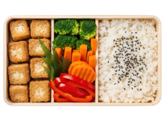 Delicious japanese bento box with fried tofu, fresh vegetables, and sesame rice