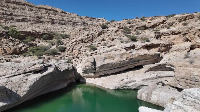 Wadi Bani Khalid is&nbsp;a popular tourist destination in Oman, known for its lush oasis, clear turquoise pools, and rugged mountain scenery.
