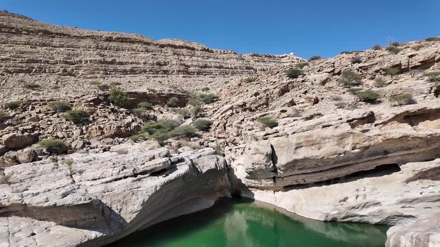 Wadi Bani Khalid is&nbsp;a popular tourist destination in Oman, known for its lush oasis, clear turquoise pools, and rugged mountain scenery.
