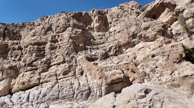 Wadi Bani Khalid is&nbsp;a popular tourist destination in Oman, known for its lush oasis, clear turquoise pools, and rugged mountain scenery.
