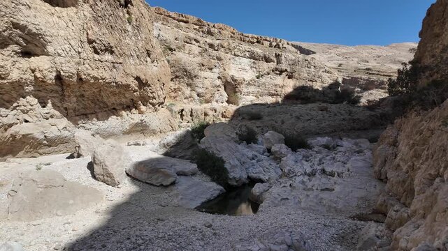 Wadi Bani Khalid is&nbsp;a popular tourist destination in Oman, known for its lush oasis, clear turquoise pools, and rugged mountain scenery.

