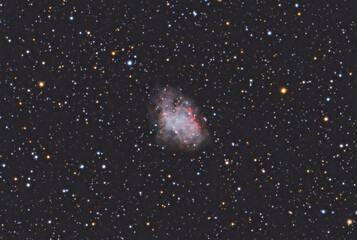 Messier 1 (the Crab Nebula): A stunning supernova remnant, the glowing, turbulent remains of a star's colossal explosion in 1054 AD. Filaments of gas expand against a backdrop of distant stars