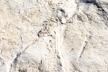 Real natural grunge rusted raw white marble stone surface texture as extracted from the mountain