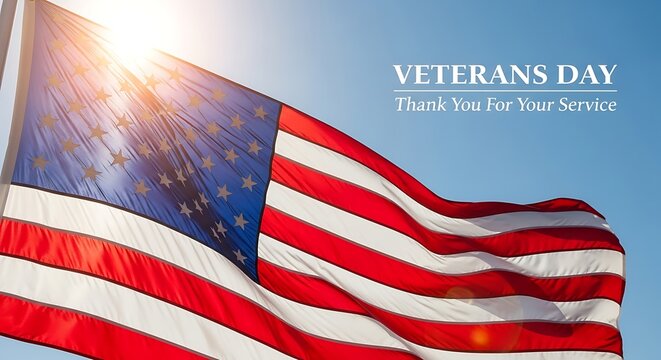American flag waving proudly on veterans day with sunburst