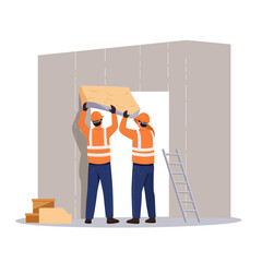 Construction workers installing ceiling tiles indoors