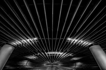 Black and White Abstract Background of Two Columns Supporting a Circular Wooden Ceiling.