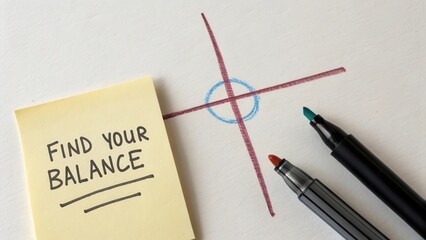 Creative Concept of Balance with Colorful Markers and Sticky Note on White Background for Mindfulness and Motivation Themes