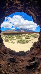 Cave view reveals desert landscape