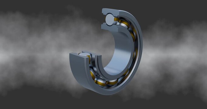 Industrial ball bearing with a cross sectional view of the inner race, outer race and a brass cage.image showcases mechanical precision and industrial engineering design.