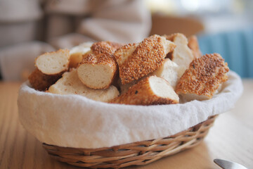 Freshly baked bread rolls in a cozy cafe setting