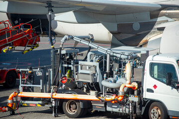 Fuel Truck Refueling an Airplane