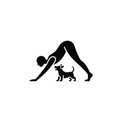 Silhouette of a person doing downward dog yoga pose with a small dog