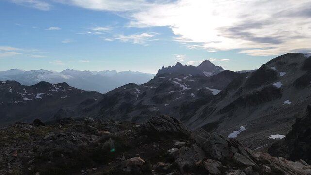 Majestic Mountain Landscape in British Columbia, Canada, with Rocky Peaks and Snow Patches